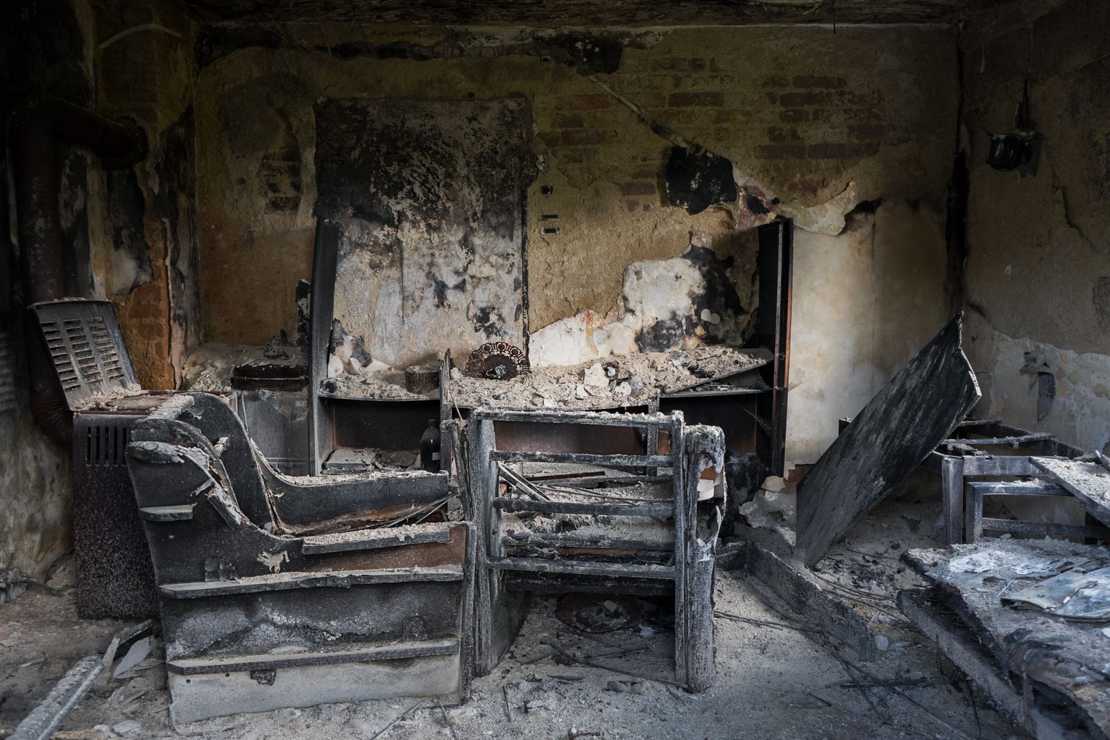 Smoke-damaged interior being cleaned