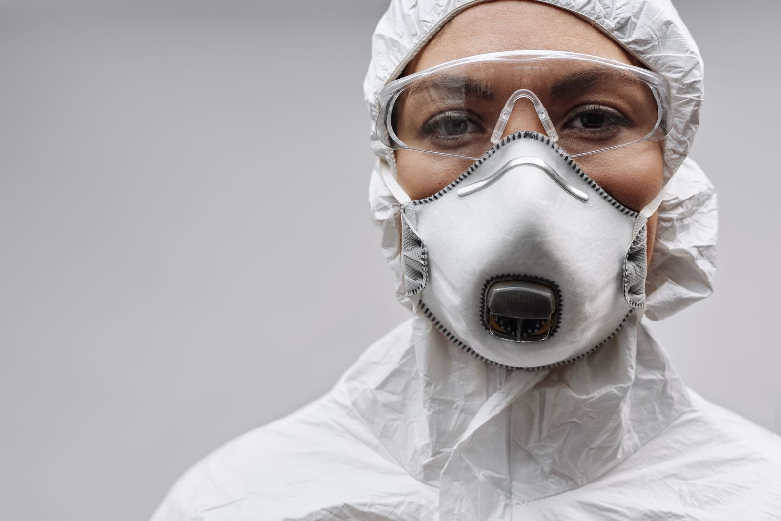 Mold growth being removed from a wall cavity
